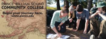 students examining map, text: begin your journey here