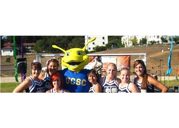 mascot and cheerleaders at UCSC event