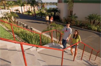 students descending outdoor stairs