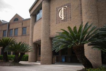 institution crest on the exterior wall