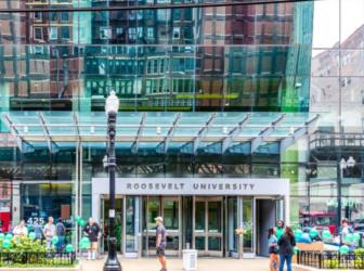 entrance of 'roosevelt university' with pedestrians