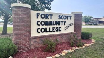 fort scott community college sign with red mulch and bushes