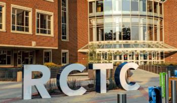 large 'rctc' letters in front of a campus building
