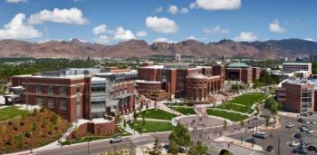 aerial view of campus with mountains in the background