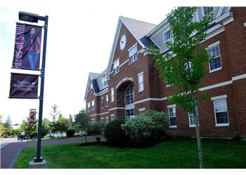 university banner above building entrance
