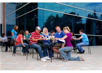students at outdoor seating area