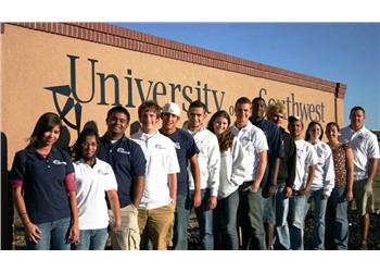 group of students in front of 'university of southwest' building