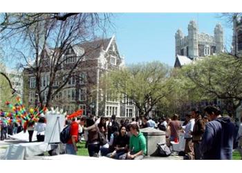 students and balloons in a campus courtyard