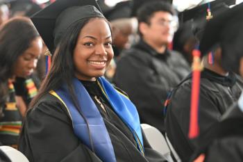 CUNY Kingsborough Community College smiling graduate