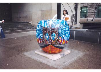 artistic apple sculpture on campus
