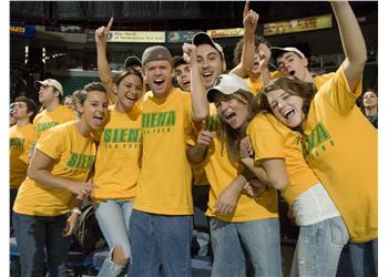 enthusiastic fans in 'sienna saints' t-shirts