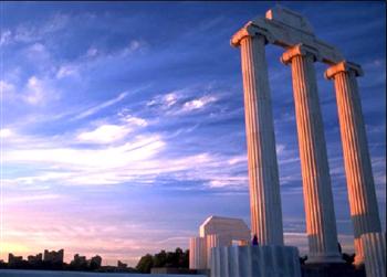 monumental pillars against a sunset sky