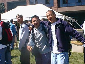 students socializing outdoors on campus