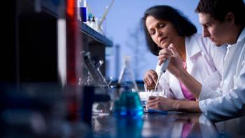 two people conducting a lab experiment