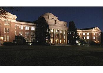 night view of an illuminated academic building