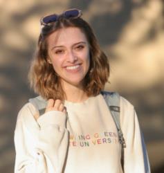 student smiling wearing bowling green state university sweatshirt