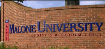 malone university christ's kingdom first sign on a brick wall