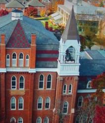 historic brick building with a clock tower at otterbein university