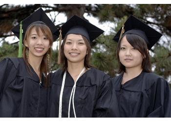 graduates smiling together