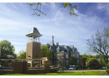 campus entrance with a clock tower