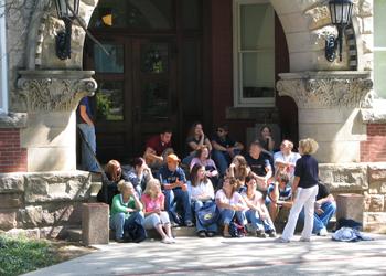 group of people gathered on outdoor steps