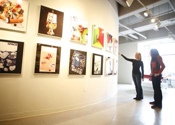 two people in art gallery