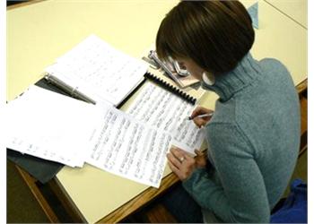 student focused on writing