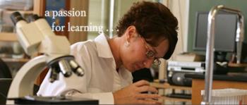 woman with microscope, 'a passion for learning'