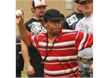 person throwing a baseball
