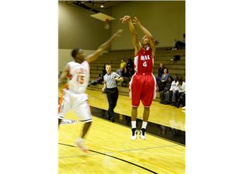 basketball player shooting during a game