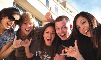 group of smiling students showing spirit