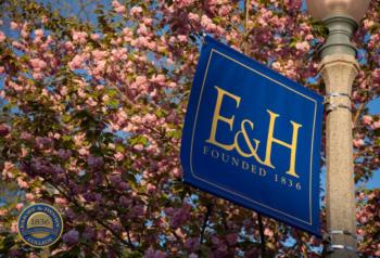 institutional sign with cherry blossoms