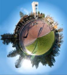 tiny planet panorama of a campus tower
