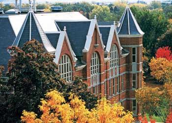 historic building with autumn trees around
