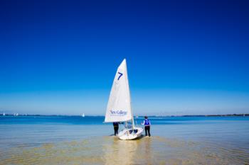 sailing on clear blue waters near campus