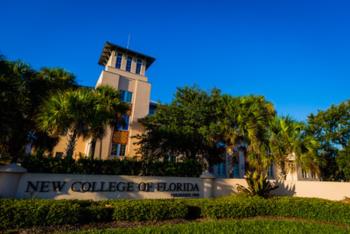campus building at sunset with 'new college of florida' sign