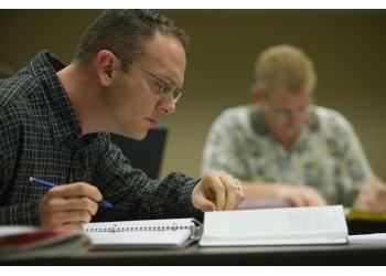 adult students studying in classroom