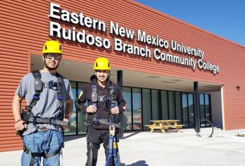 two people in safety gear outside eastern new mexico university ruidoso branch
