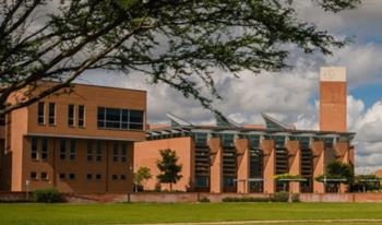 modern campus building and lawn